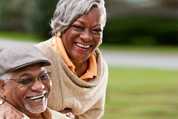 african american couple smiling at the camera